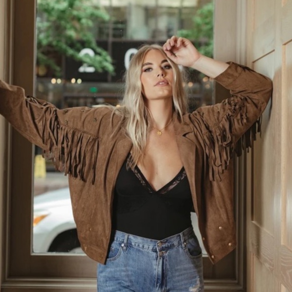 Kittenish brown fringe jacket